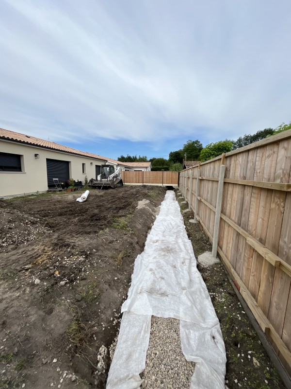 Drainage d’un fossé avec chargeuse et poly benne au Taillan Médoc en Gironde
