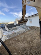Videau Terrassement -  Location de niveleuse pour travaux de nivellement précis sur terrain accidenté et surfaces étendues au Cap Ferret sur le bassin d'Arcachon